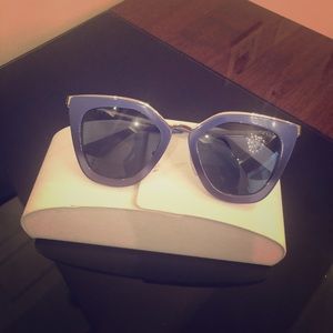 Prada sunglasses with a case. Worn once !
